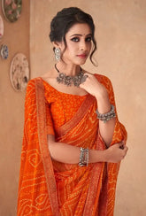 India Silk Orange Chiffon Saree Features A Beautifully Attached Banarasi Border Combining The Softness And Flow Of Chiffon